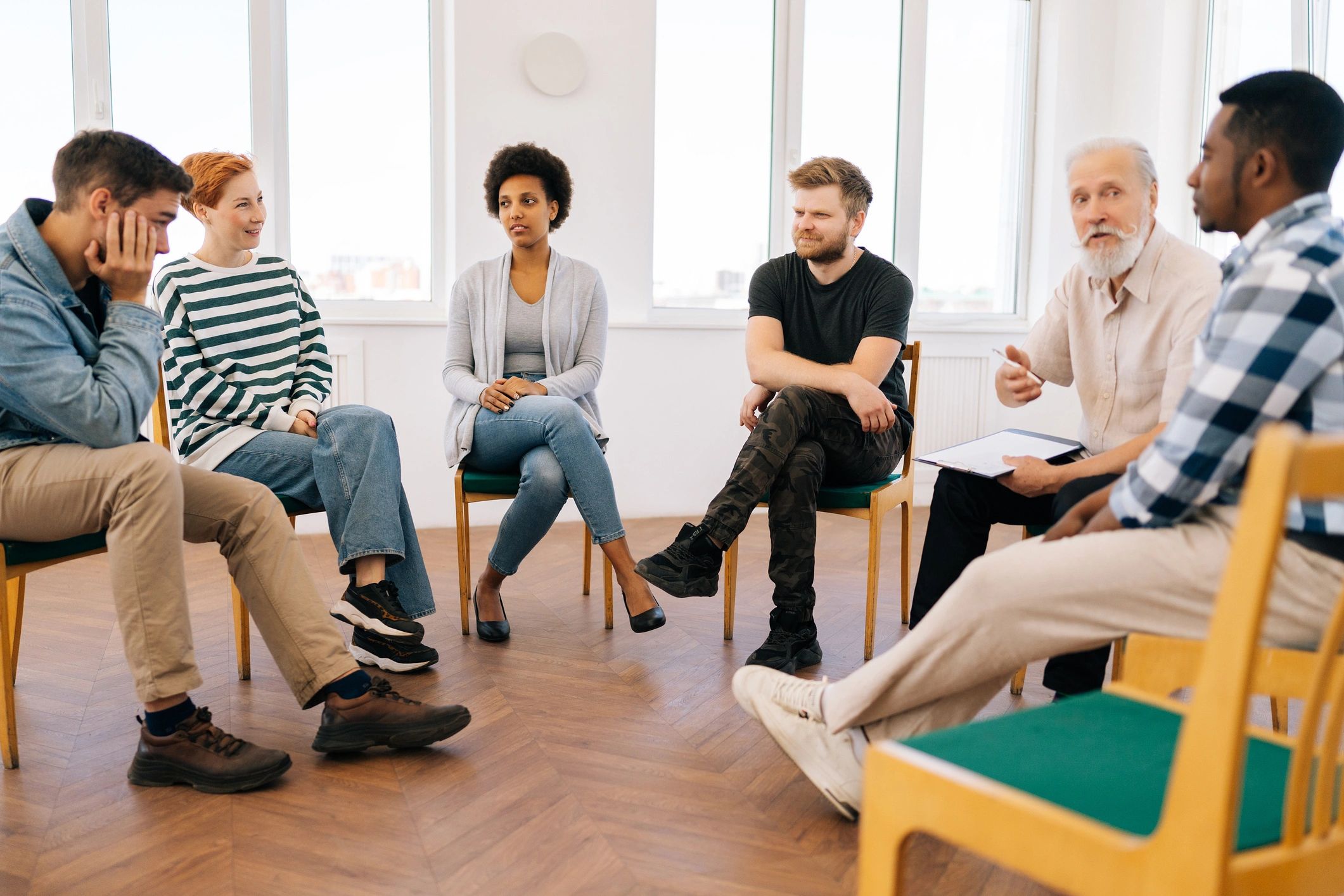 Group therapy session in a supportive environment